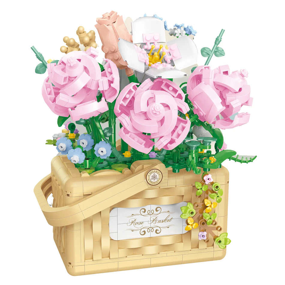 Productfoto van het Balody miniblocks bloemstuk in mandje met roze rozen en andere bloemen